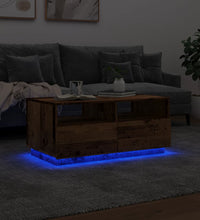 Couchtisch mit LED-Leuchten Altholz-Optik 90x49x40 cm