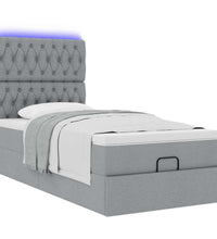 Ottoman-Bett mit Matratze & LEDs Hellgrau 100x200 cm Stoff