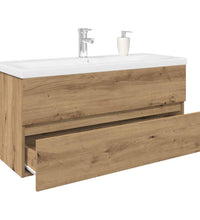 Waschbeckenunterschrank mit Einbaubecken und Wasserhahn