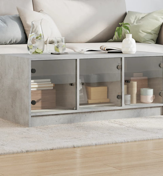 Couchtisch mit Glastüren Betongrau 102x50x42 cm